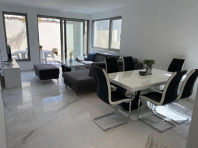 Luxury Two-Bedroom Apartment with Two Private Parking